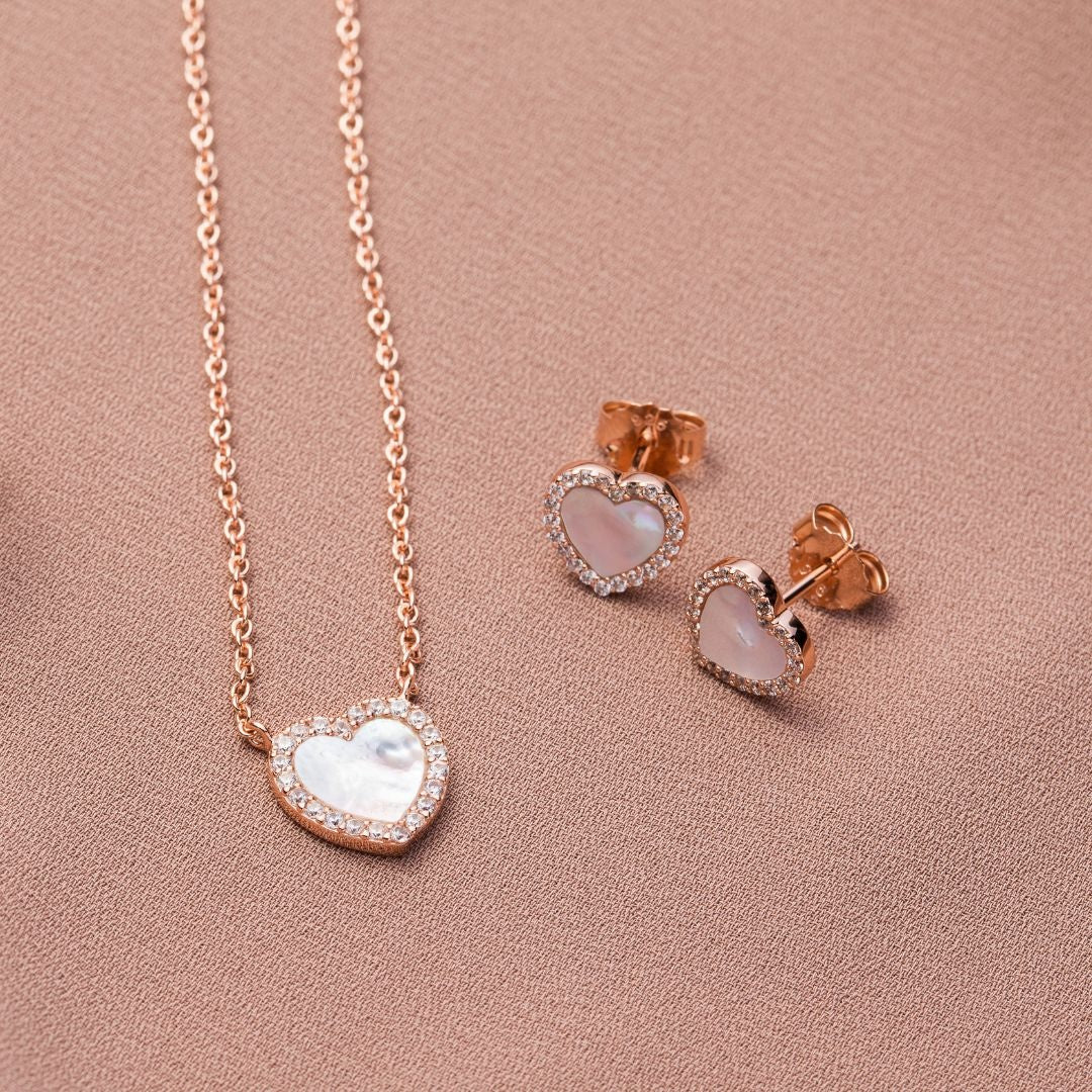 Mother of Pearl heart studs in gold