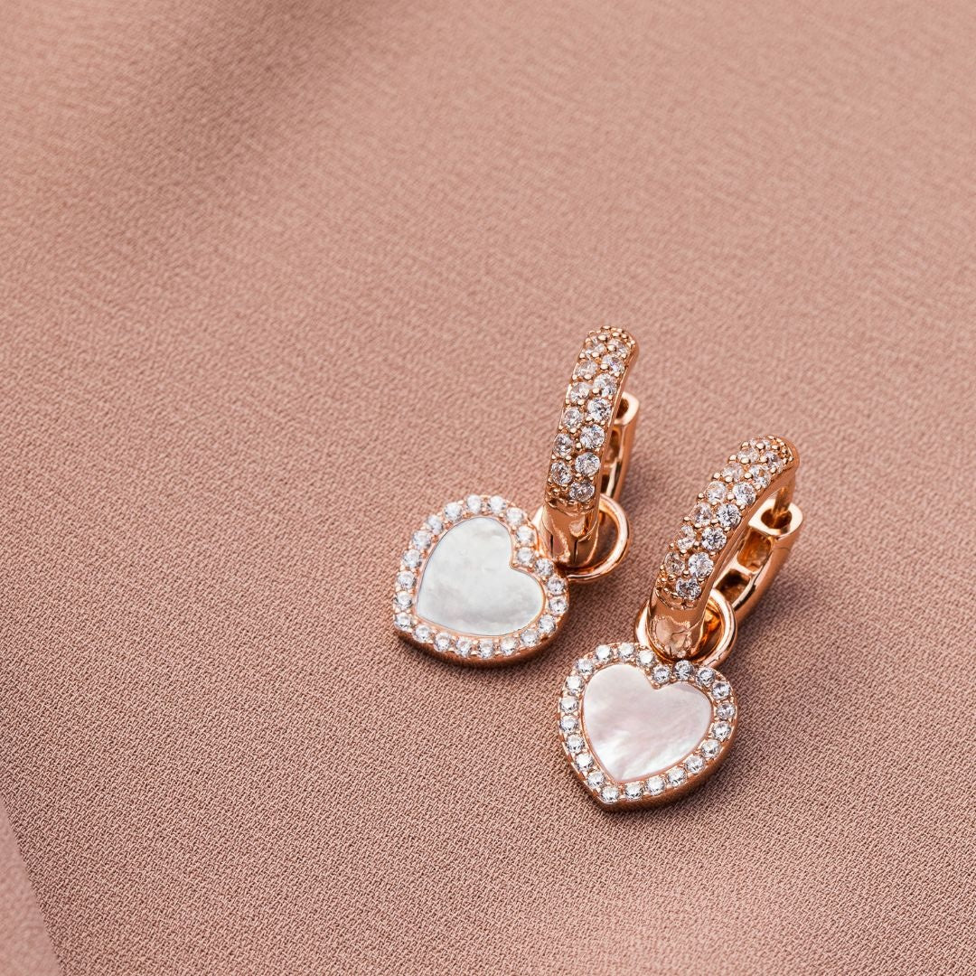 Mother of pearl heart charms in gold